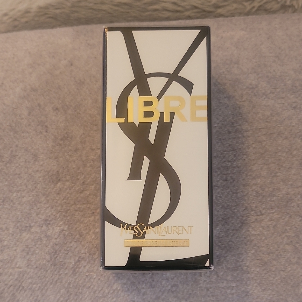 Yves Saint Laurent Libre in Black, White, and Gold